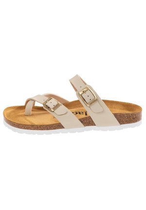 Sandalias beig con correas ajustables dobles, hebillas en tono dorado, plantilla de corcho y suela de goma blanca. Textura mate suave con un diseño minimalista.