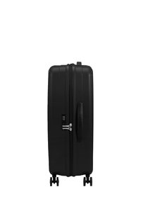 Valigia nera rigida con design verticale, due ruote, maniglia laterale e serratura a combinazione. Superficie liscia con logo in rilievo.