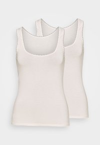 To sleeveless tank top i lys beige, med en rund halsutskjæring og delikate kanter langs kanten. Laget av myk bomull.