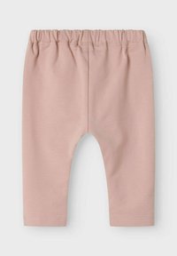 Lyserøde leggings med elastisk talje, lavet af blødt og strækbart materiale. Har en glat tekstur og kantede manchetter, med et enkelt design.