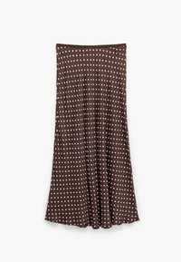 Brun, knälång kjol i mjukt tyg, med ett vitt prickigt mönster över hela. Utställd design med resår i midjan.
