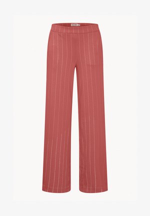 Laiad püksid heledas korallitoonis valgete vertikaalsete triipudega; sile kangas, elastne vöökoht ja nähtamatud taskud või kinnitused.