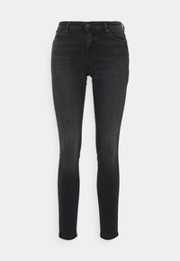 Jeans skinny negros fabricados en denim, con una cintura de altura media, bolsillos frontales y una textura suave. Diseñados con un estilo clásico de cinco bolsillos.