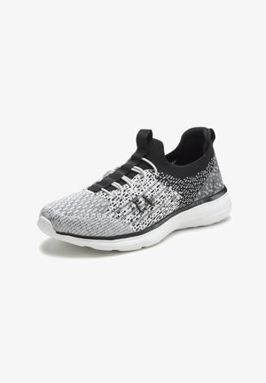 Black and white knitted athletic shoe with a flexible upper, textured pattern, elastic laces, and a cushioned white sole.