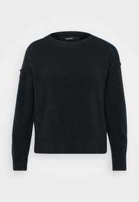 Sweater preto de malha com gola redonda, mangas longas e bainha canelada. Textura suave com um corte ligeiramente solto e ombros caídos.