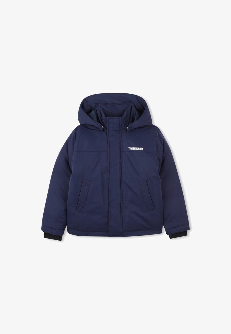 Giacca imbottita blu navy con cappuccio, dotata di zip frontale, due tasche laterali e il logo Timberland sul petto.