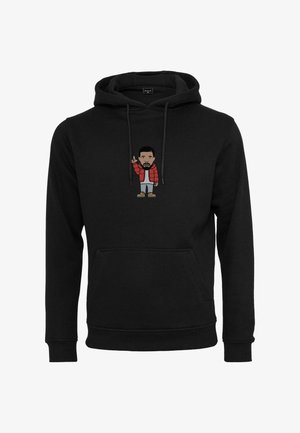 Sudadera negra con un gráfico de dibujos animados en el pecho. El material es suave, con un amplio bolsillo frontal y capucha con cordón.