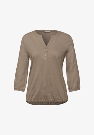 Ruskea pitkähihaisen paita, jossa on kolmen napin V-kaula-aukko, joustavat hihansuut ja helmassa, yksivärinen tekstuuri kangas.