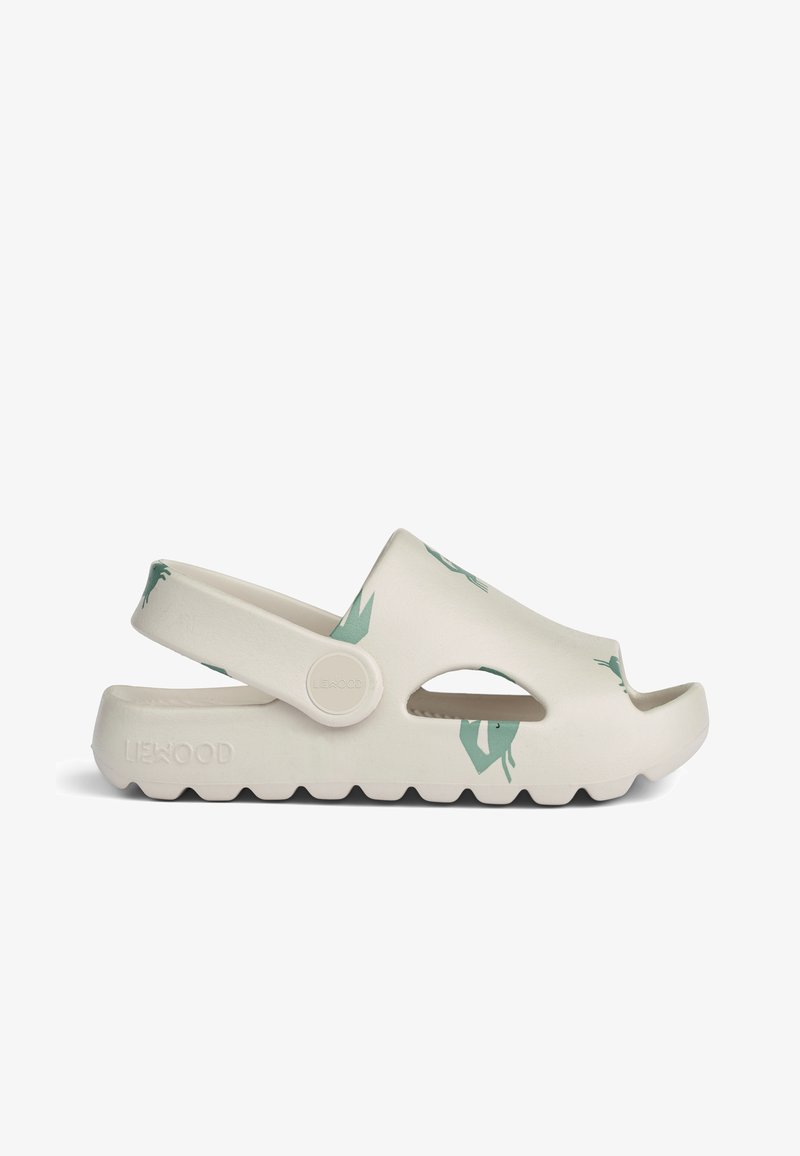 Clogs in off-white material with green abstract pattern, open-toe design, adjustable strap, and textured sole for grip.