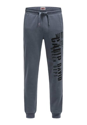 Herren grau Sweatpants aus Baumwoll-Mischung, mit einem elastischen Bund und Kordelzug, Seitentaschen und bedrucktem schwarzem Text entlang des Beins.