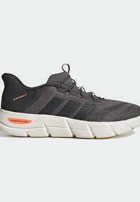 Black athletic shoe with textured fabric upper, featuring three black stripes, an orange "CLOUDFOAM FLEX" detail, and a chunky white sole.