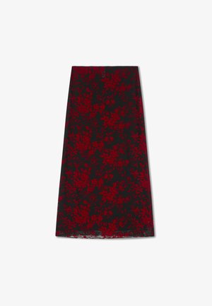 Gonna nera con motivo floreale rosso, alla lunghezza del ginocchio, con orlo a scallop. Realizzata in materiale leggero con una texture liscia.