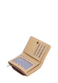 Beige leather wallet with a textured finish, featuring multiple card slots, a clear ID pocket with a polka dot pattern, and a zippered closure.