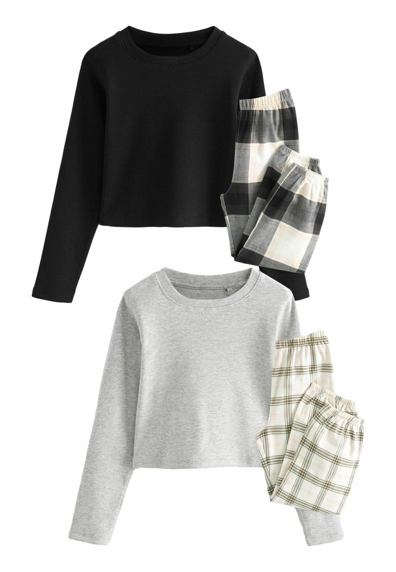To sæt af loungewear: en sort cropped langærmet top og en grå langærmet top, parret med sorte og hvide ternede bukser og beige ternede bukser.