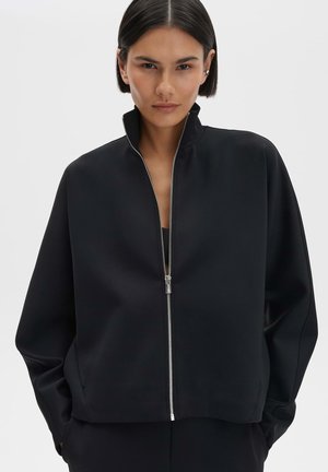 LOOSE SLIGHTLY - Sweater met rits - black