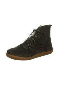 Dunkelbraune Wildleder-Schnürstiefelette mit Wollfutter und flexibler, gummiartiger Sohle, seitlich betrachtet.