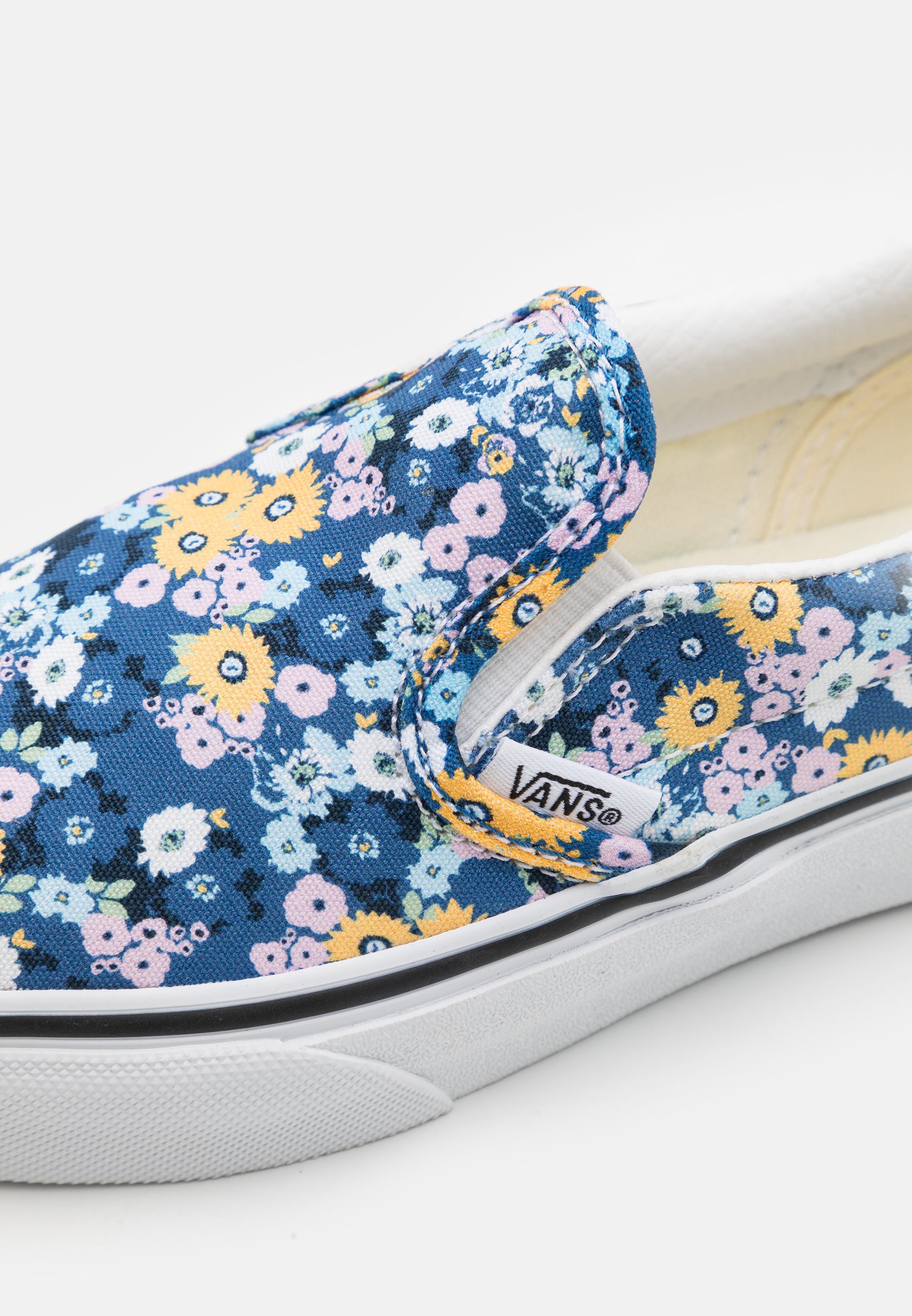 multi colored vans slip ons