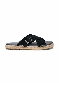 Sandale à glissière noire avec brides croisées, boucle en métal, semelle enveloppée de jute et petit détail rouge, blanc et bleu sur le côté.