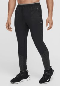 Nike Performance - Spodnie treningowe