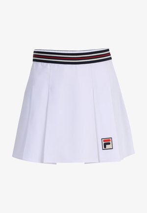 Valkoinen laskostettu hame, jossa on musta, punainen ja valkoinen raidallinen vyötärö, ja jossa on logo-patchi helmassa erottuvissa väreissä.