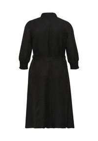 Black dress featuring a collared neckline, long puff sleeves with elastic cuffs, a waist tie, and a textured fabric finish.