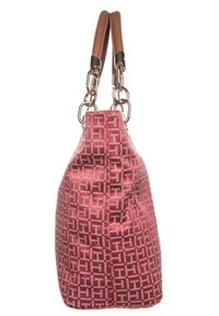 Sac à main à motif rouge et blanc avec des poignées en cuir marron attachées par des maillons de chaîne dorée, vu de profil.