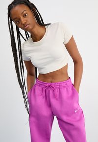 Nike Sportswear PANT  - Treniņtērpa apakšdaļas - hot fuchsia