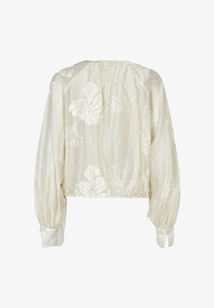 Lyhyt blusa vaaleassa kankassa, jossa on valkoista kukkakirjontaa. Pitkät, puffimaiset hihat ja napit hihansuissa. Rypytetty pääntie.