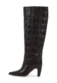 Black knee-high boot made of textured croc-embossed leather. Features a pointed toe and a tapered heel for an elongated silhouette.