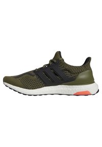 Chaussure de course tricotée verte et noire avec semelle blanche coussinée et maintien des lacets style cage noire, vue de côté sur fond blanc.