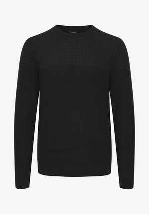 Mustmustestega mustriga, ümar kaelus, tekstuurse ülaosaga ning ribakätiste ja -äärega. Valmistatud pehmest ja soojast kangast.