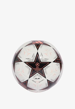 Palla da calcio bianca con dettagli neri e arancioni. Presenta pannelli a forma di stella, branding della UEFA Champions League e superficie testurizzata.
