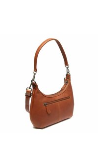 Braune Lederhandtasche mit geschwungenem Design, einem Schulterriemen und einer Fronttasche mit Reißverschluss. Glatte Textur mit dezenten Stichdetails.