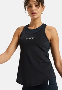 Black athletic tank top with Roxy logo, features a high neckline, racerback design, and smooth fabric texture.