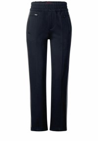 Marineblaue tapered Hosen mit einem Gummibund, zwei Fronttaschen und weißen seitlichen Streifen. Weicher Stoff mit glatter Textur.