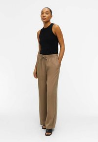 Object OBJTILDA TALULA LONG NOOS - Housut - fossil