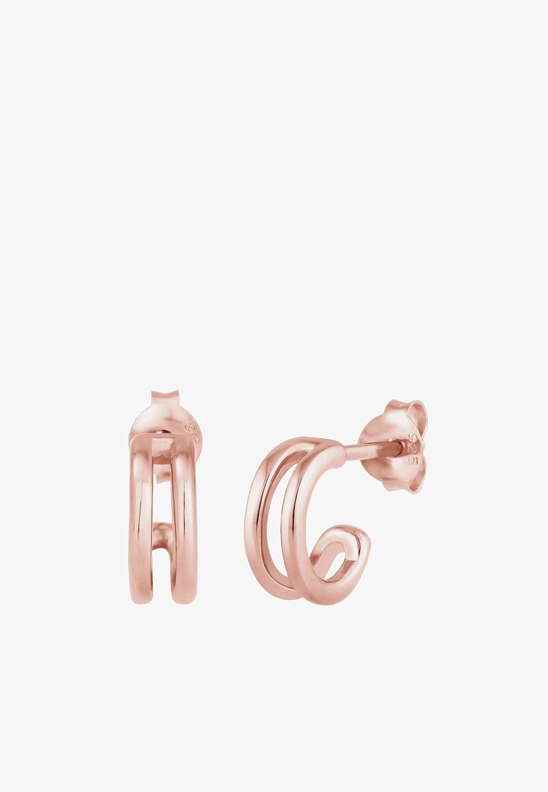 Boucles d'oreilles à double créole en or rose avec fermoirs papillon, finition métal poli et design minimaliste ouvert.