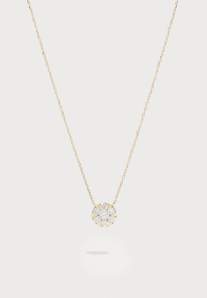 Χρυσό κολιέ με κρεμαστό αστέρι που διαθέτει μια κεντρική ομάδα διαυγών κρυστάλλων, σε λεπτή αλυσίδα. Απλός και κομψός σχεδιασμός.