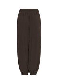 Pantalon ample marron foncé avec taille élastique et bas élastiques aux chevilles, présenté sur fond blanc. Pas de poches ou de logos visibles.