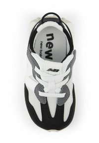 White athletic shoe with black and grey accents, featuring a textured upper, prominent logo, and traditional lacing system.