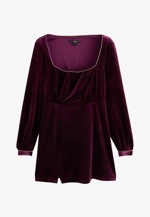 Purple velvet dress with long puff sleeves, square neckline, and gathered detailing at the bust. Features a subtle side slit and decorative trim.