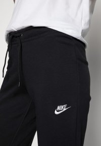 Nike Sportswear PANT TIGHT  - Jogginghose - black/white