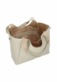 Beige strukturierte Tragetasche mit weichem hellbraunem Innenfutter, ausgestattet mit einer Reißverschlusstasche und zwei Griffen. Offenes Design für einfachen Zugriff auf den Inhalt.