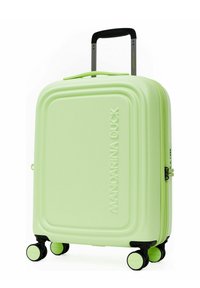 Valise rigide vert clair avec surface texturée, poignée supérieure et quatre roulettes noires pour une mobilité facile.