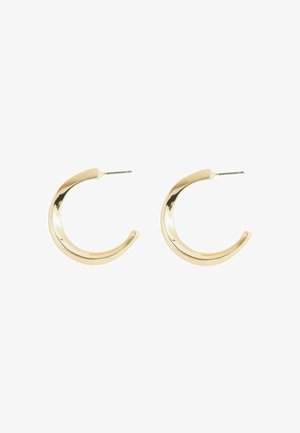 Boucles d'oreilles en métal doré avec une finition lisse et polie, en forme de croissant courbé. Présentent un fermoir à tige pour un port sécurisé.
