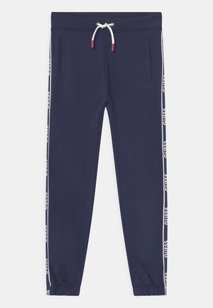Marineblaue Sweatpants aus weichem Stoff, mit seitlichen Taschen, elastischen Bündchen und einem Kordelzugbund mit kontrastierenden Logo-Streifen.