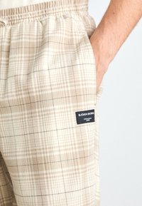Björn Borg CORE PYJAMA PANTS - Pyjamasbukse - sand/off-white