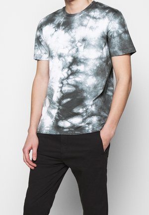Tie-dye T-shirt i grå og hvide nuancer, korte ærmer, rund hals, lavet af bomuld, med et hvirvlende mønster og afslappet pasform.
