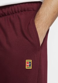 Nike Performance HERITAGE PANT - Calças de fato de treino - dark beetroot
