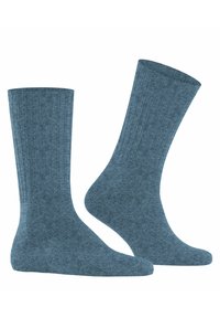 Calze blu a coste realizzate in un morbido tessuto testurizzato. Presentano un design a lunghezza crew con punta rinforzata e una vestibilità comoda.